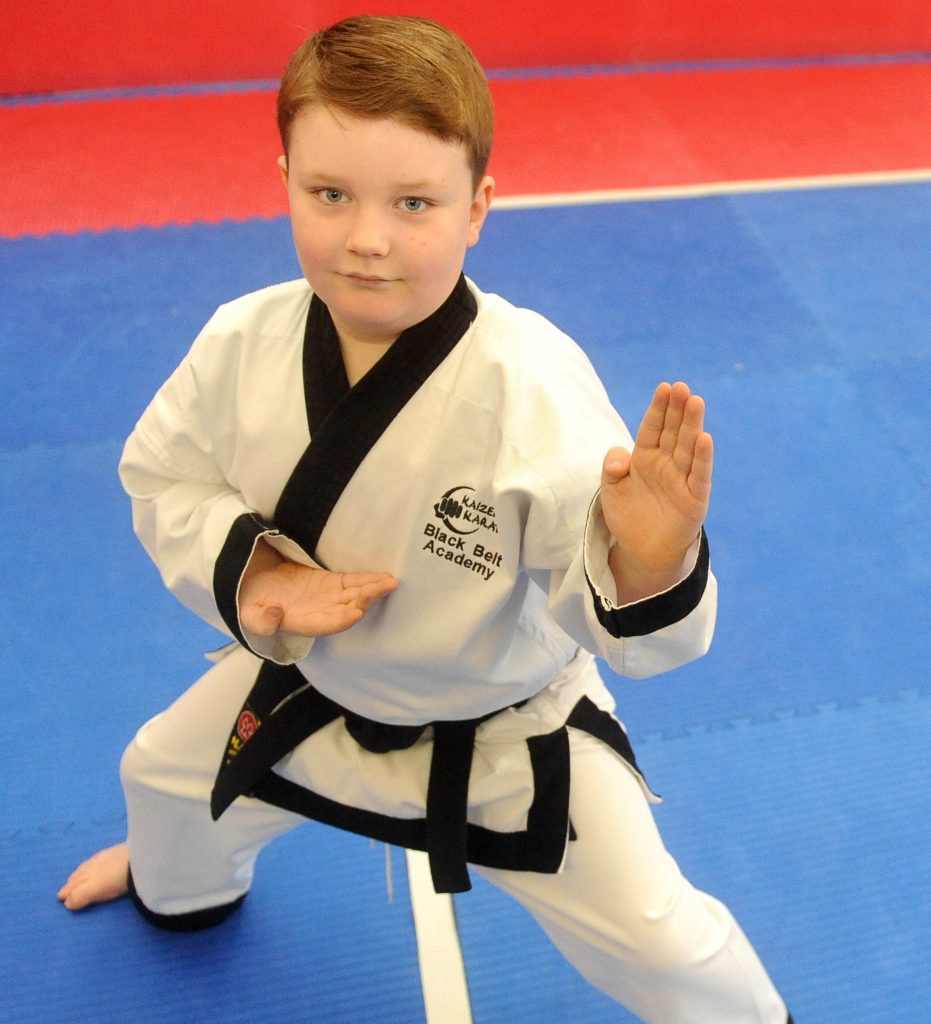 The real Karate Kid Rochdale boy, 7, kicks way into record books