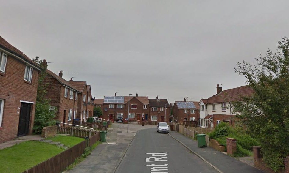 Hunt for brazen gunman who 'sprayed Wigan house with bullets' and fired