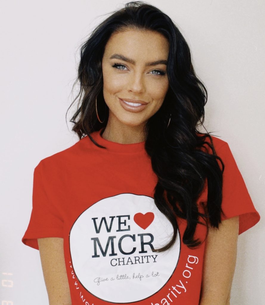 Rosie Williams wearing a We Love MCR t-shirt