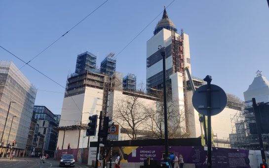 A photo of Manchester Town Hall under construction