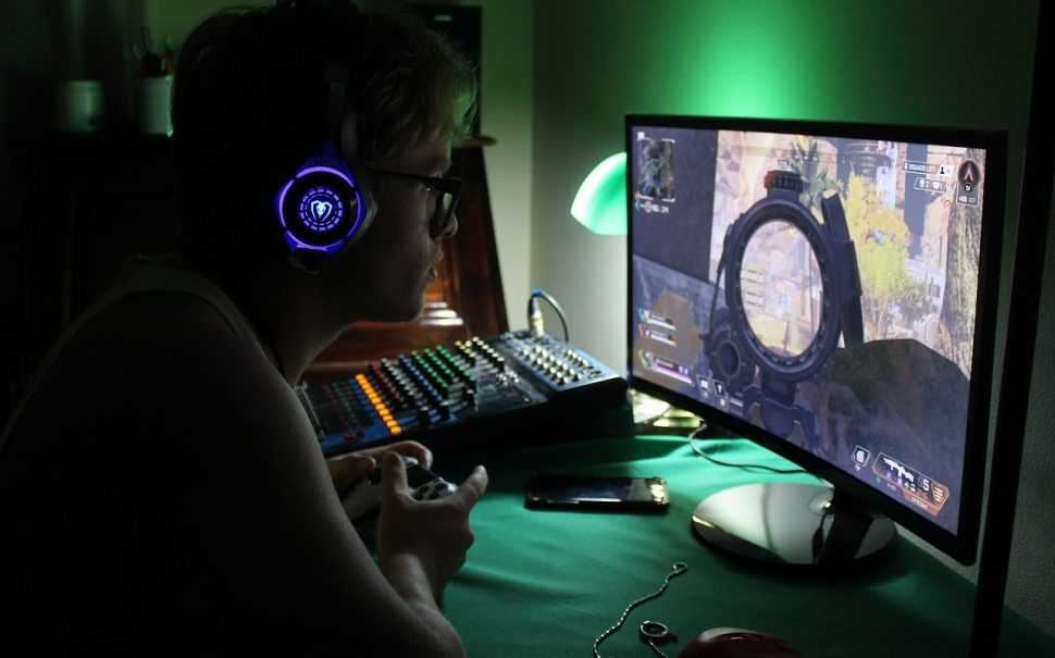 a person gaming on their computer