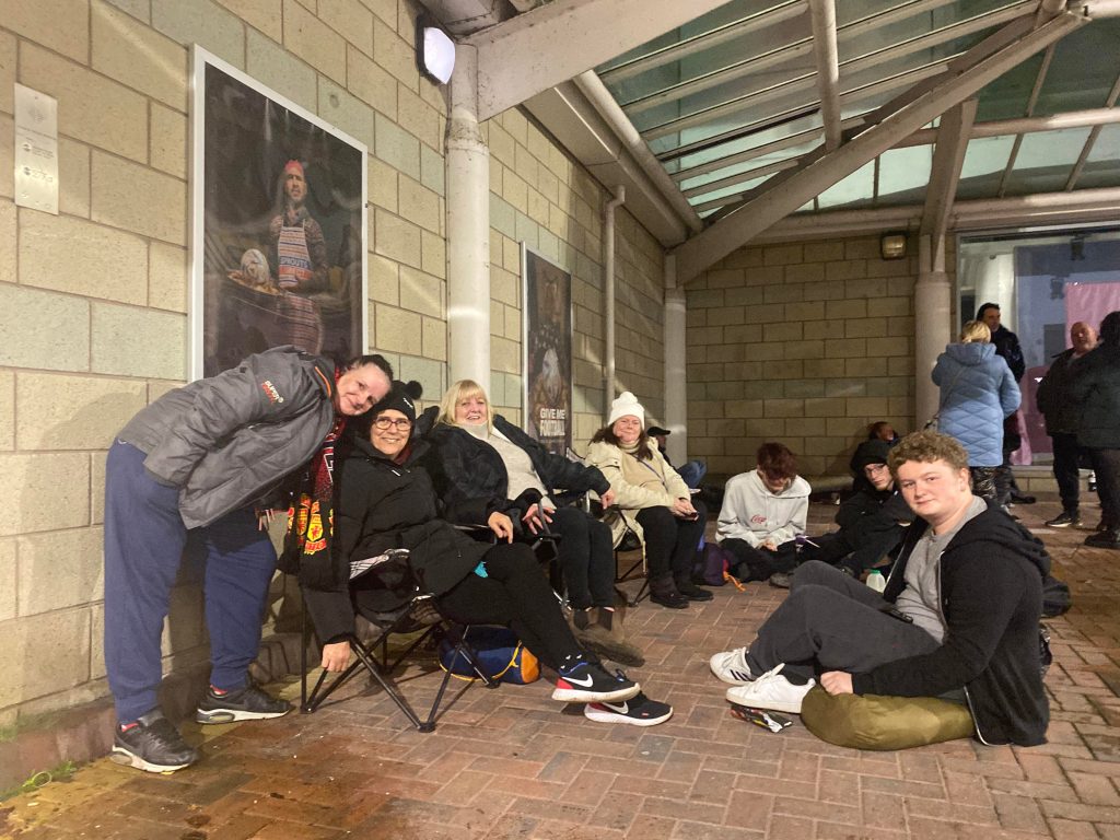 Bury Homeless Project volunteers smile at the camera