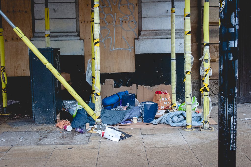 A stock photo of a a pile of belongings on the street