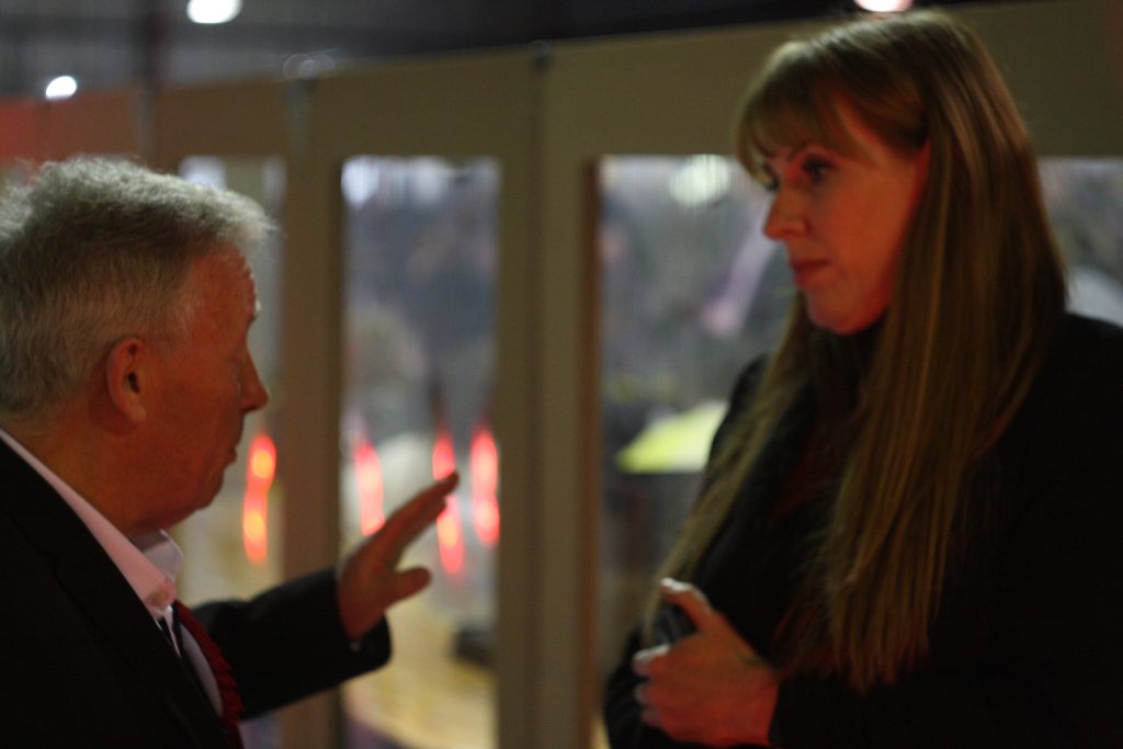 Angela Raynar MP speaks to Chairman Councillor Ged Cooney in Tameside