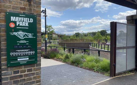 The front entrance of Mayfield Park, with the gate open