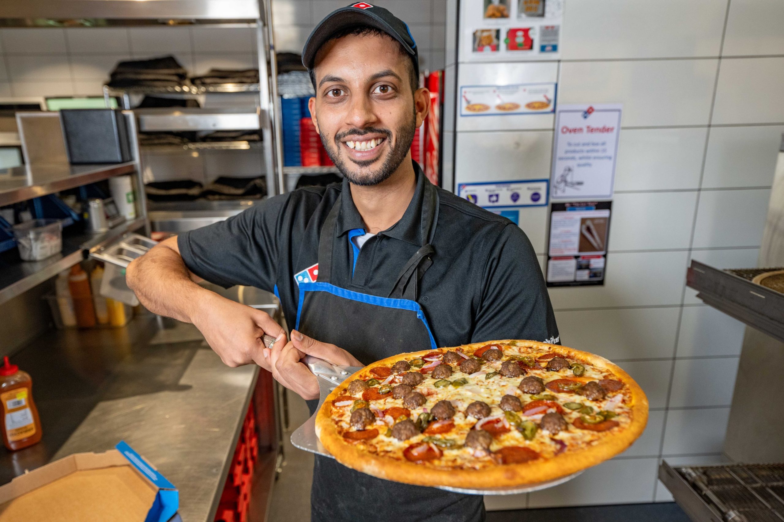 Domino's celebrate 5,000 new jobs launch with staff member's own spicy