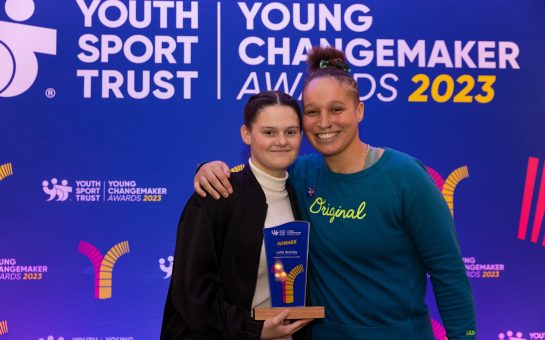 Laila Stanley receives her award from England rugby star Shaunagh Brown