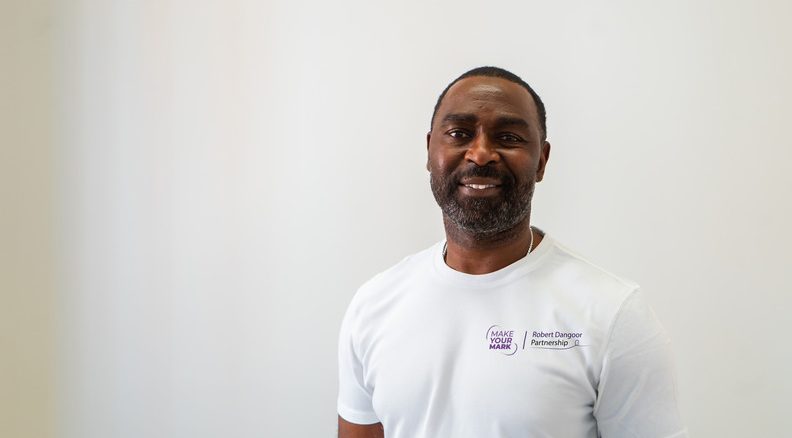 Headshot of Andy Cole wearing Make Your Mark t shirt