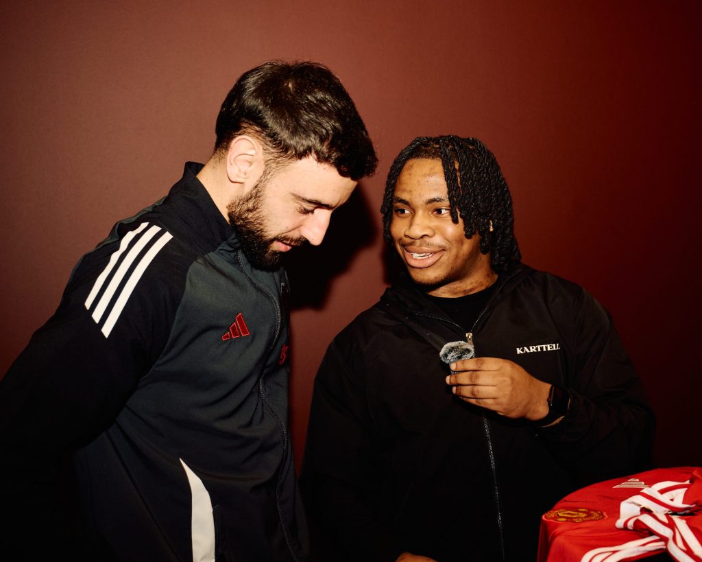 Sports Content Creator, Simon Gbeleyi interviewing Manchester United's, Bruno Fernandes. Permission to use. Credit: Mark Holland.