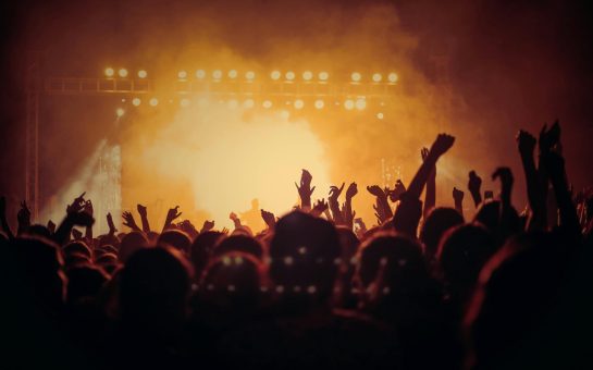 People waving their hands in the air