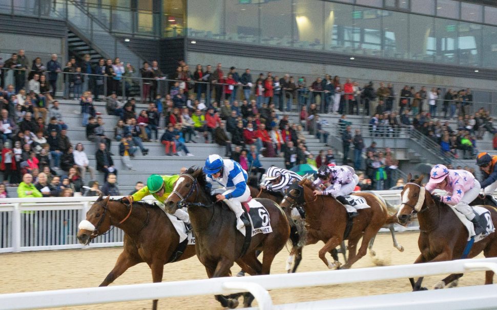 People racing on horses