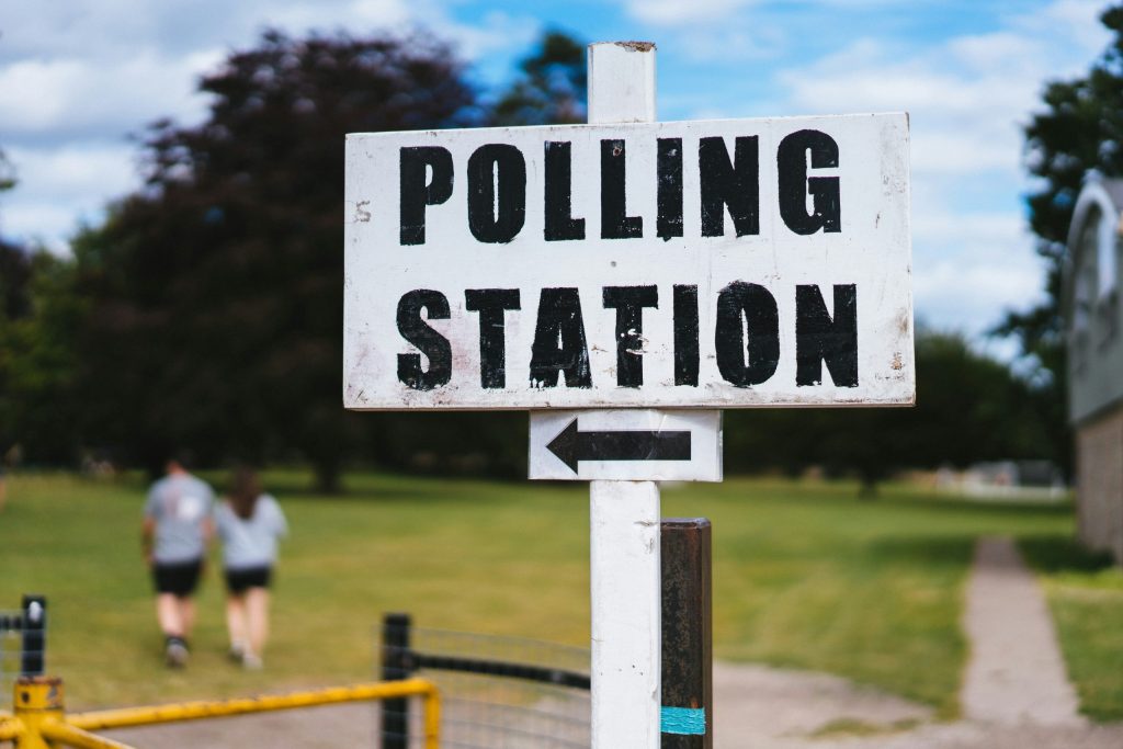 A picture of a polling station sign